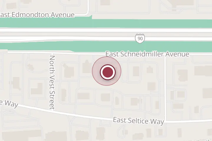 Street map around 1670 E Schneidmiller Ave, Post Falls, with a pin at Denny's Restaurant