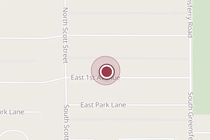 Street map around 1709 E 1st Ave, Post Falls, with a pin at Organix Pest Control