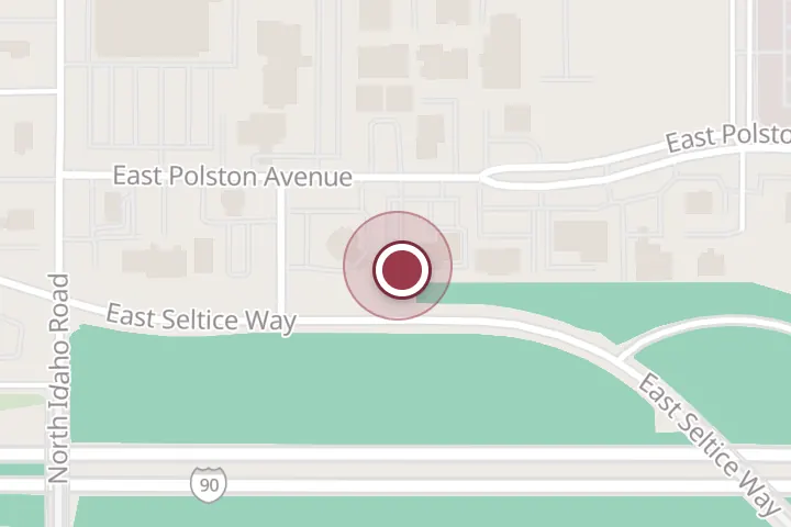 Street map around 1100 E Polston Ave, Post Falls, with a pin at Woodland Family Dental